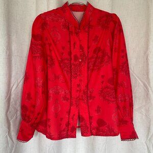 Red paisley blouse